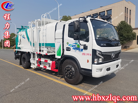 處理食物殘?jiān)易钤谛?，新能源油電混合餐廚垃圾車(chē)實(shí)現(xiàn)健康生活每一天
